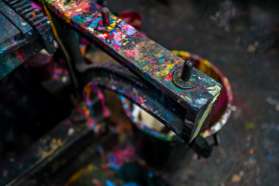 A cast iron frame of the historical letterpress machine is seen splattered with printing inks at a printing workshop in Cali, Colombia.