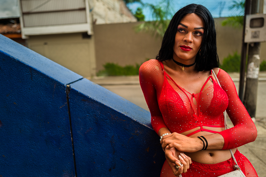 A Colombian transgender woman waits for sex service clients in the street in Cali, Colombia.