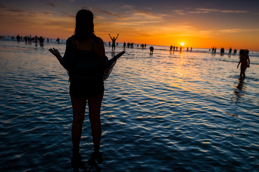 A Uruguayan woman, an Umbanda follower, prays during a ceremony in honor of Yemanjá, the goddess of the sea, on the seashore in Montevideo, Uruguay.