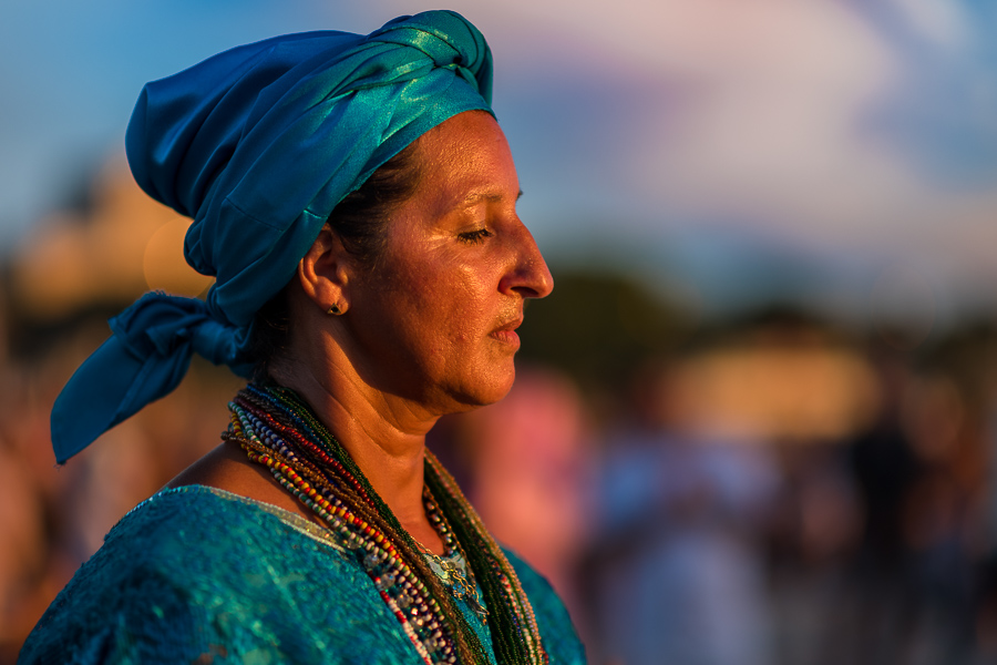 A worshiper of Umbanda, the Afro-Uruguayan religious cult, prays to the goddess Yemanjá during a ritual ceremony on the seashore in Montevideo, Uruguay.