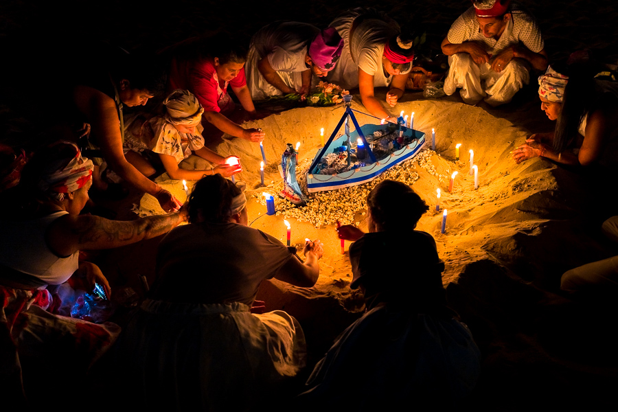 Devotees of Umbanda, the Afro-Uruguayan religious cult, pay tribute to the goddess Yemanjá during a ritual ceremony on the seashore in Montevideo, Uruguay.